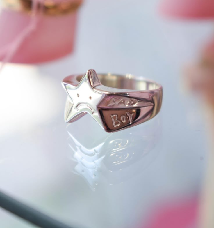 The cutest little star ring with a sad buy made from solid sterling silver or plated brass. His frowned face reminds you that some time it is ok to be a little sad.  Each sad boy is carved by hand, so there might be slight difference between the ring you receive and the one pictured.  *Details The ring is approximately 1.5cm (0.8in) wide You can choose between brass and sterling silver Silver or gold plated ♥ Every piece is carefully handcrafted in my studio in Thessaloniki ♥ ** The ring picture Funky Rings Silver, Frowned Face, Sterling Silver Star Shaped Signet Ring For Anniversary, Cute Silver Rings For Birthday, Sterling Silver Star-shaped Signet Ring For Gift, Kissing Rings, Quirky Rings, Strange Rings, Quirky Ring