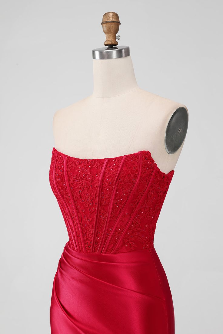 Details: Set the party on fire in our Red Tight Strapless Homecoming Dress, featuring a fiery red hue and a flattering corset design. With intricate beading for some added sparkle, this dress is perfect for a night of fun and flirty homecoming festivities. Show off your curves in style!   Features:    Silhouette: Sheath Style 
  Color: Red,Dark Green,Fuchsia,Royal Blue,Green,Purple  Length: Short Mini 
  Neckline: Strapless 
  Sleeves: Sleeveless 
  Back: Zipper  
  Embellishment: Corset,Satin, Strapless Fitted Corset For Cocktail Occasions, Fitted Strapless Overbust Cocktail Dress, Strapless Fitted Corset For Cocktail, Fitted Strapless Corset For Cocktail, Fitted Overbust Strapless Cocktail Dress, Party Corset With Ruched Bodice, Party Overbust Corset With Ruched Bodice, Party Corset With Boning And Sweetheart Neckline, Party Corset With Sweetheart Neckline And Boning