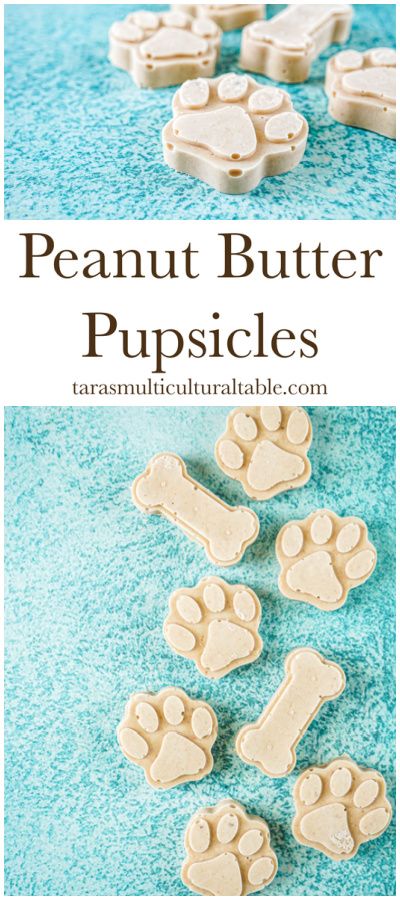 Paw and bone shaped Peanut Butter Pupsicles on a blue background. Banana Treats For Dogs, Peanut Butter Pupsicles For Dogs, Pupsicles Dog Treats Recipe, Woof Pupsicle Recipes, Peanut Butter And Jelly Dog Treats, Greek Yogurt Dog Treats, Frozen Peanut Butter Dog Treats, Greek Yogurt Dog Treats Peanut Butter, Peanut Butter Banana Treats For Dogs