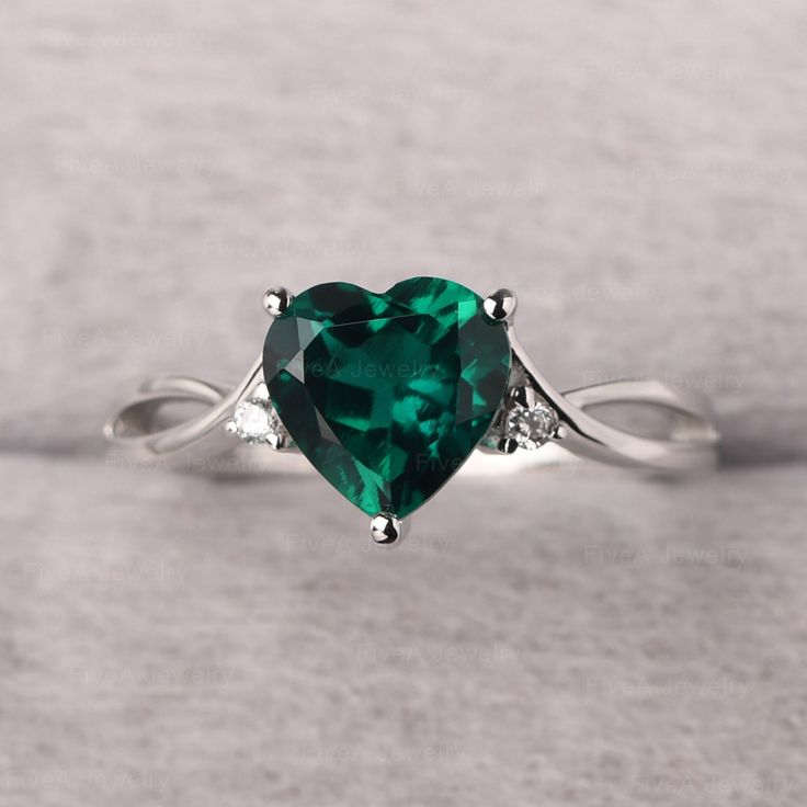 ◆ The ring is handcrafted from sterling silver and decorated with a dazzling 8*8 mm emerald and CZs. It is suitable for engagement/anniversary/daily occasion. ◆ Production Description: Main stone Type: Lab Emerald Main Stone Shape: Heart Cut Main Stone Size: 8*8 mm(1.59ct) Side stone: CZ Metal: 925 Sterling silver - Other options available in the drop down menu ◆ Customization: √Free for Add Engraving √Other Metal Type Available √Other Gemstones & Shapes Available √Personalization Requests Avail