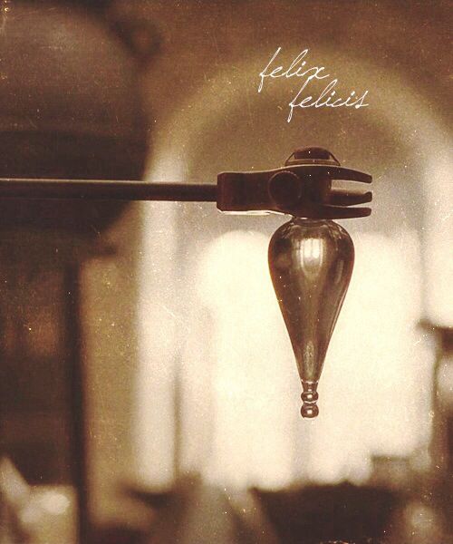 an upside down view of a water droplet on a glass surface with the word hello fearless written above it