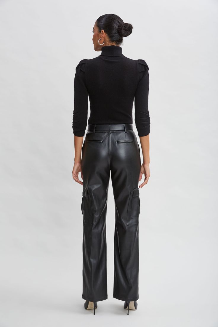 Luxe Vegan Leather lends a chic expression to the season's must have Cargo Pant. The relaxed fit, pintuck details & cargo pockets are the definition of sporty cool. Get ready for the compliments. Elie Tahari Exclusive Vegan Leather Cargo Pants 50% Polyester, 50% Polyurethane Relaxed Fit; Runs true to size. Model is 5'9" and wearing size 2 Measurements: Front Rise: 11"L , Inseam: 32.75"L (approx. length for size 6) Dry clean Imported Style #: E90AM214 Fall Fitted Utility Cargo Pants, Fitted Utility Cargo Pants For Fall, Chic Bottoms With Flap Pockets For Fall, Fall Workwear Full-length Cargo Pants, Modern Cargo Pants With Pockets For Workwear, Fall Cargo Pants With Multiple Pockets For Work, Chic Cargo Pants With Hip Pockets For Fall, Fitted Cargo Pants With Side Pockets For Fall, Winter Workwear Cargo Bottoms