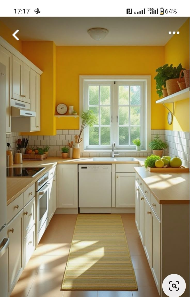 a kitchen with yellow walls and white cupboards, an area rug on the floor