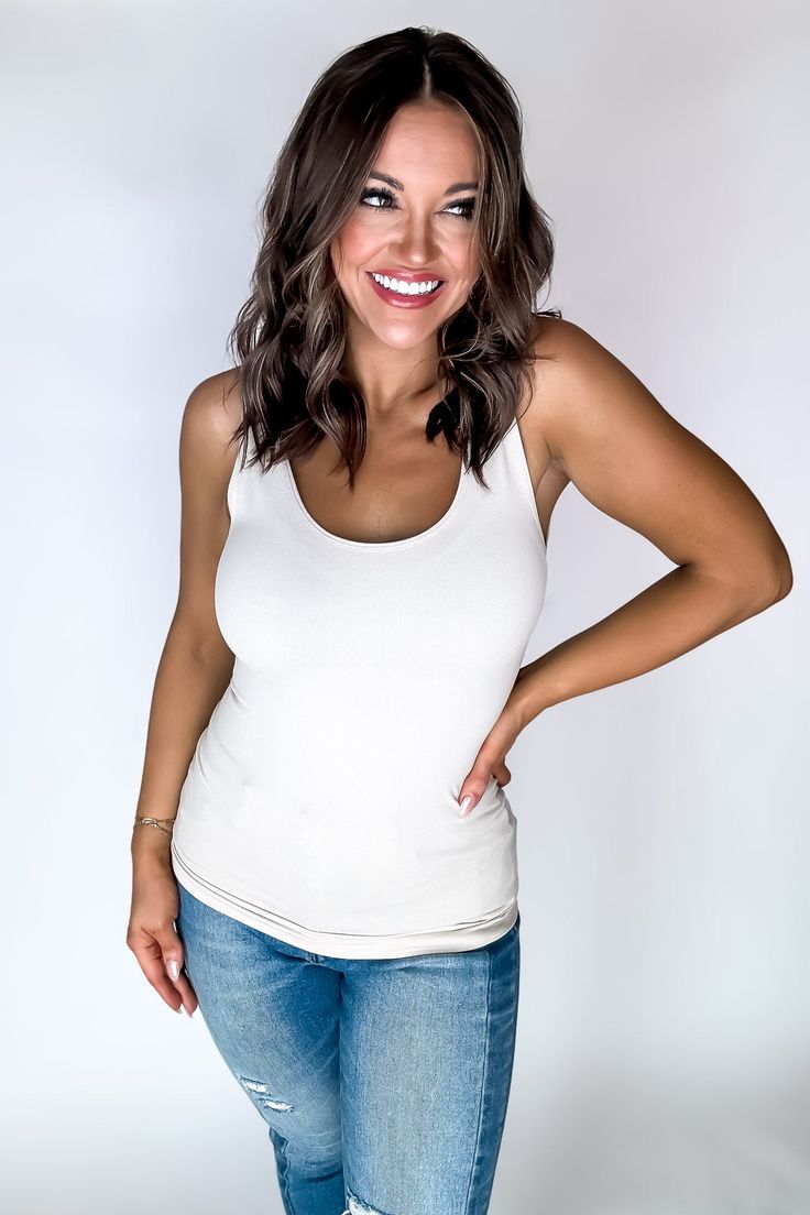 Stay stylish and comfortable with The Everything 2 Way Seamless Tank. This versatile tank features stretchy material that can be worn as a scoop neck or reversed to a v-neck for a customizable look. Plus, it can be stretched long or worn in a shorter length. Perfect for any wardrobe! Fit: She is wearing her true size medium. Fits true to size. If in between sizes, size down. Sand Beige, Look Plus, 2 Way, Stretchy Material, Scoop Neck, Size Medium, V Neck, Wardrobe, How To Wear