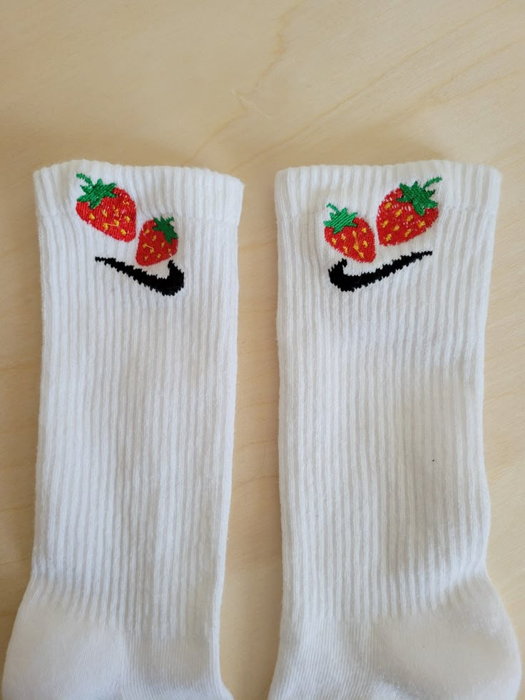 Strawberry socks with two Strawberries adjacent from each other. These cute socks are trendy with medium size bright red strawberries with yellow speckles. The strawberry embroidery is cute design that makes a pop of color statement. Imagine a strawberry field on top of your crew socks, spring/summer vibes whenever you wear a pair.  SIZE M (6-10 WOMEN, 6-8 MEN) L ( 10-13 WOMEN, 9-12 MEN) The design is embroidered on the outer side of each sock. NOT on both sides of 1 sock. If you want it on both Cheap Trendy Socks With Letter Print, Strawberry Socks, Strawberry Embroidery, Aesthetic Socks, Strawberry Field, Pretty Socks, Embroidery Cute, Embroidered Socks, Trendy Embroidery