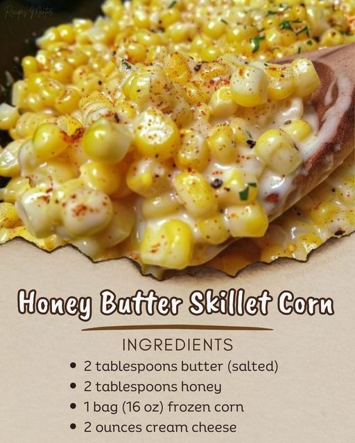 an image of a plate of corn on the cob with butter and seasoning