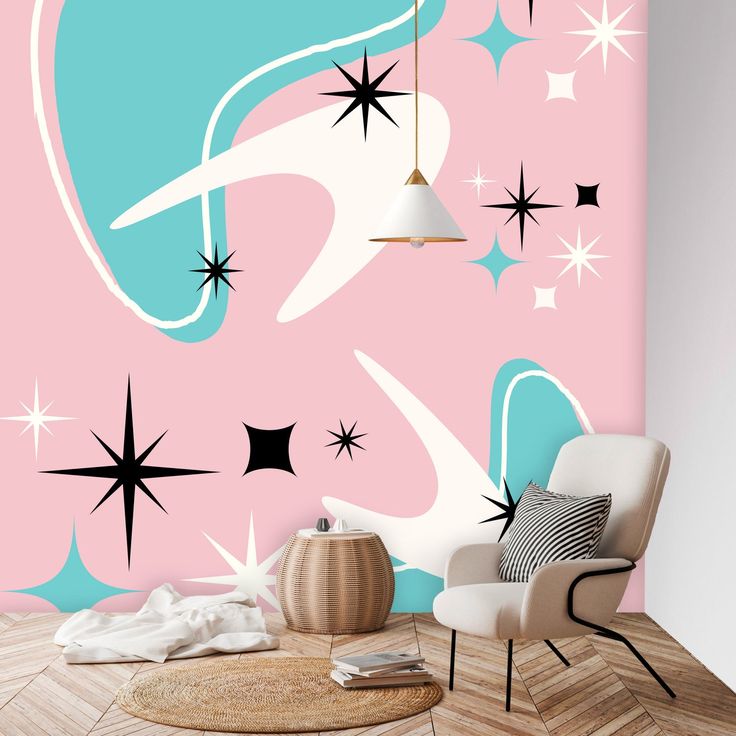 a living room with pink walls and stars on the wall