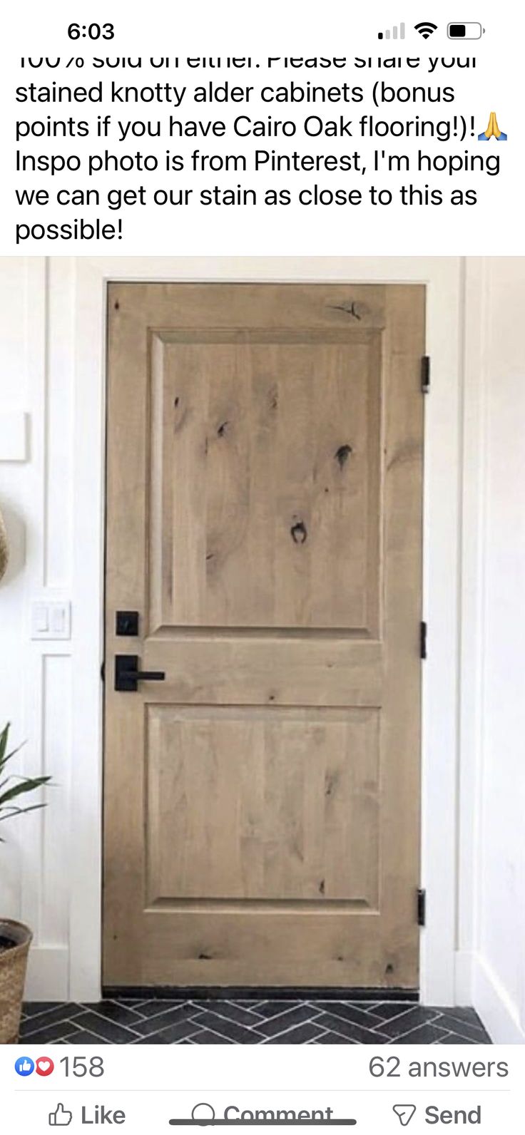 the front door is made out of wood