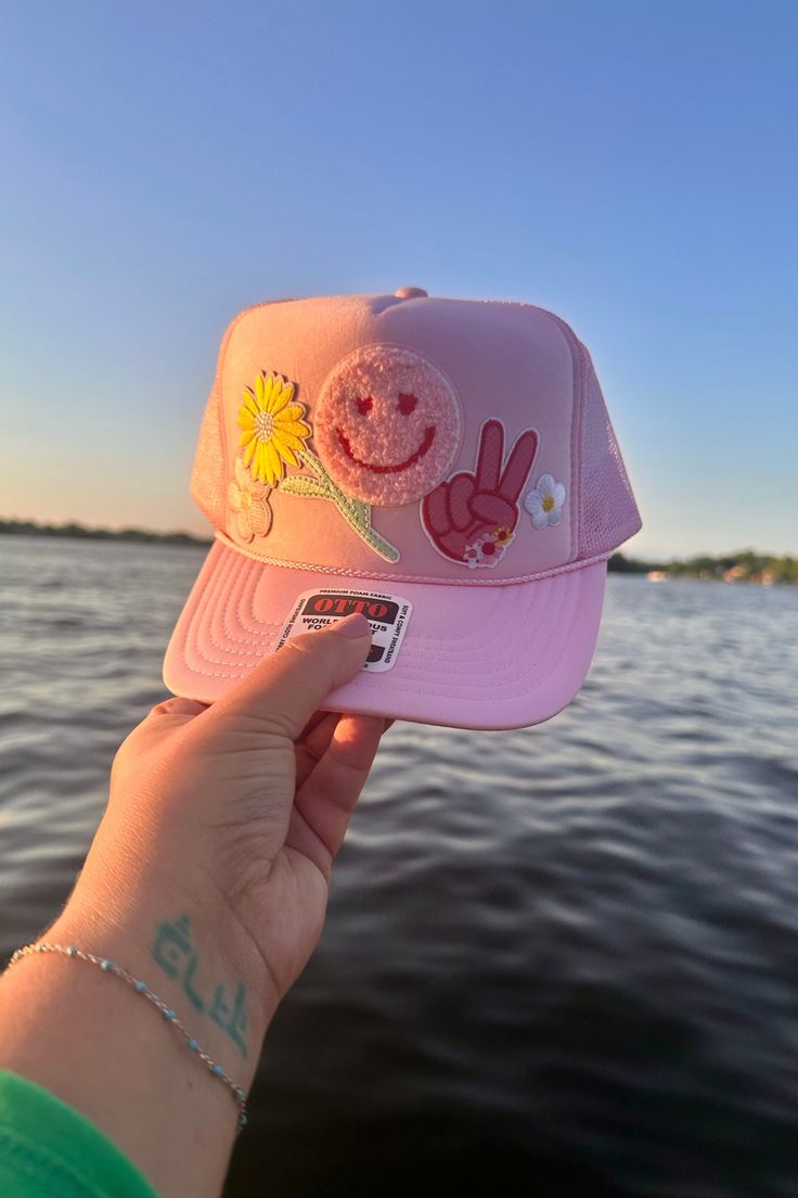 A Wild Bohemian exclusive! One of a kind, trucker hat with patches to match your own unique style! Adjustable snap back closure. Lightweight & breathable mesh back. Made with a durable foam material