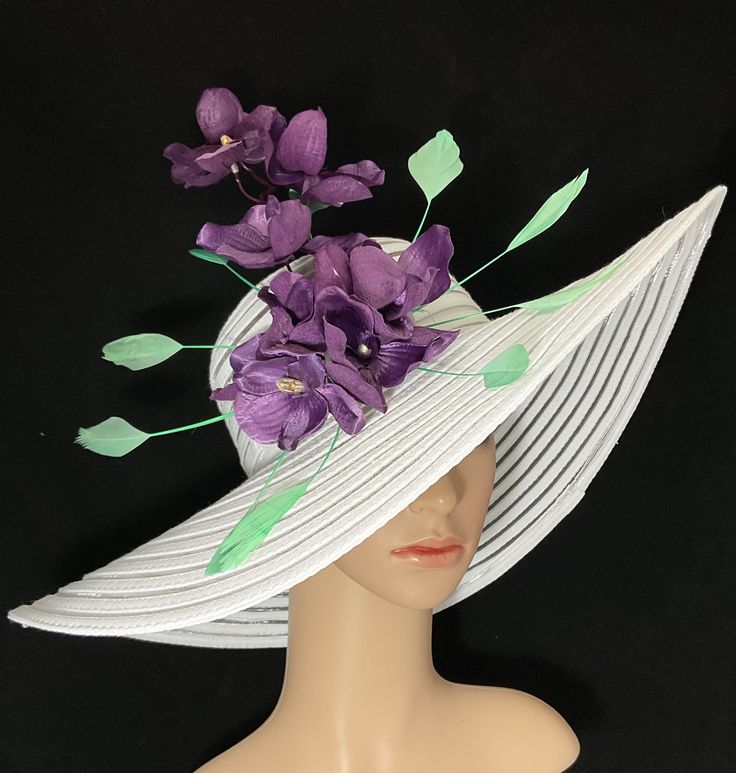 Gorgeous Kentucky Derby Ascot Hat              100% Brand New   Designed & Made in USA         Beautiful hand embellished wide brim hat adorned with green stripped coque rooster feathers and purple orchids. This gorgeous hat has a 22.5 inches interior crown circumference.The Brim is 5 3/4 inches.It fits most!    Hat Base Color: White This is a high quality wide brim hat with wire which could hold it's shape.It won't flop in the eyes and face. And it will protect your face and hair from hot sun and wind. It's perfect for outdoor event. Would be great for Wedding, Bridal Shower, Tea Party, Concert,Evening Wear, Belmont,Ascot, Derby day,Races, Church, Art Photography,etc. This hat listing is Ready to Ship! Item will be shipped from US within 24 hours after receiving cleared payment . For US o Fitted Wide Brim Costume Hat For Beach, Fitted Wide Brim Hat For Beach, Elegant Wide Brim Mini Hat For Vacation, Curved Brim Top Hat For Spring Vacation, High Crown Sun Hat For Spring Vacation, High Crown Sun Hat For Spring Beach, Fitted High Crown Boater Hat For Beach, Elegant Mini Hats With Curved Brim For Vacation, High Crown Sun Hat For Beach In Spring