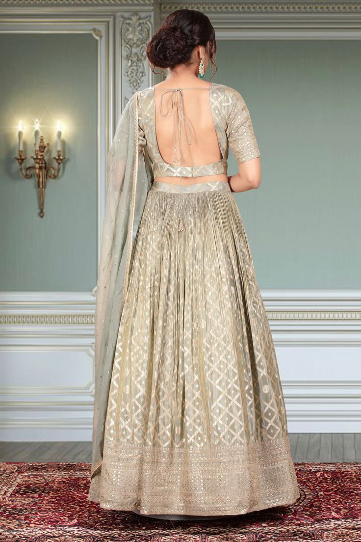 This Party Wear Lehenga D-345 features stunning gold embroidery, adding an elegant touch to any event. Expertly crafted, this traditional garment showcases intricate detailing and timeless style. Perfect for special occasions, this lehenga is sure to make a statement. Fitted Gold Anarkali Set In Georgette, Gold Fitted Anarkali Set In Georgette, Fitted Gold Georgette Anarkali Set, Semi-stitched Choli With Zari Work For Eid, Eid Anarkali Choli For Reception, Gold Georgette Choli For Transitional Season, Fitted Gold Anarkali Set With Dupatta, Festive Sharara With Cutdana For Reception, Fitted Sharara With Gold Embroidery For Festive Occasions