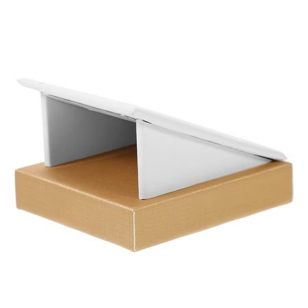 an open box with a white laptop in it