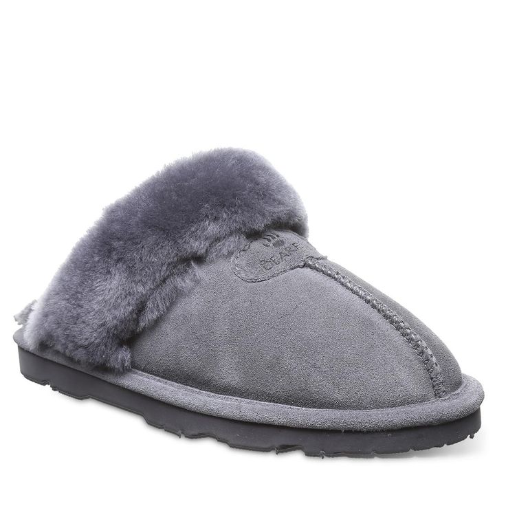 PRICES MAY VARY. Slip-On Sheepskin Lining Comfort sheepskin footbed Lightweight and cushion molded outsole Imported The BEARPAW Loki is a plush way to start your day. These slippers feature soft suede uppers with a sheepskin collar that is easy to maintain and offers the utmost in comfort. Our sheepskin lining regulates body temperature to keep your feet warm, and the sheepskin footbed provides additional softness and reduces foot fatigue. The durable rubber outsole makes this the perfect indoor Bearpaw Slippers, Most Popular Shoes, Best Slippers, Shoe Company, Body Temperature, Women's Slippers, Womens Slides, Bearpaw Boots, Shoe Style