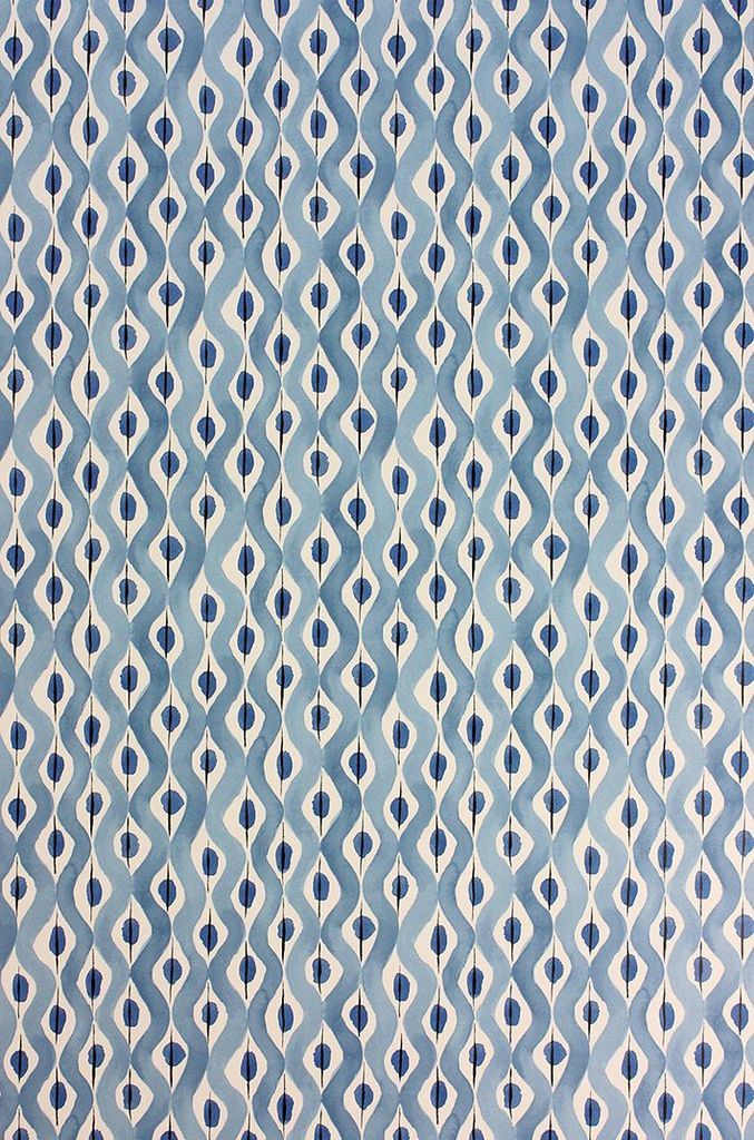 an abstract blue and white pattern on fabric