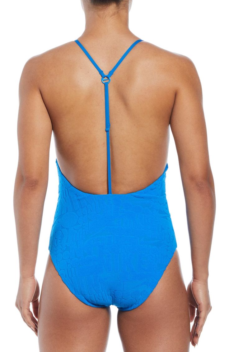 The flattering shape of this one-piece starts with a scoop neckline that gives way to an elongating T-strap design along the open back. T-strap back Full back coverage Lined 93% recycled polyester, 7% spandex Hand wash, line dry Imported Beach Swimwear With Adjustable Straps And Scoop Back, Nike Swimwear For Summer Vacation, Scoop Neck Bodysuit With Adjustable Straps For Pool, Nike Solid Color Swimwear For Beach, Nike Stretch Swimwear For Beach, Nike Solid Color Beachwear Swimwear, Beach Bodysuit With Solid Scoop Back, Beach Bodysuit With Scoop And Solid Back, Sleeveless Tie Back Bodysuit For Swimming