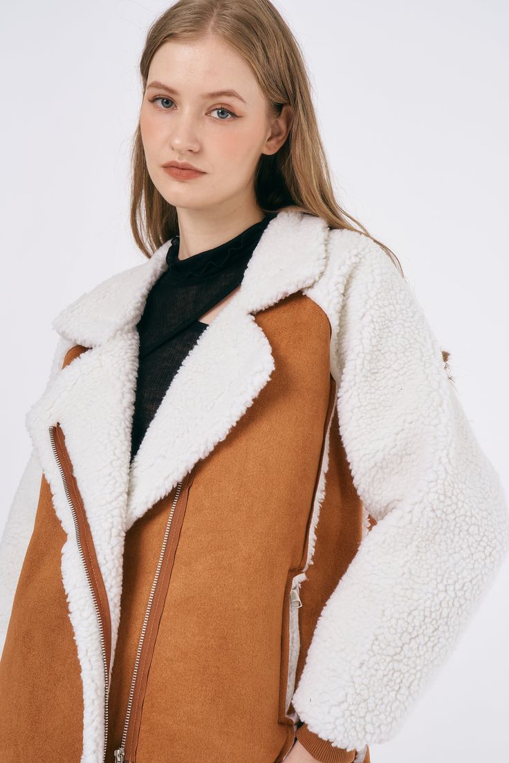 Gianna Faux Shearling Jacket. Runs small. Zip close. Contrast sleeve detail Product Specification. 85% Polyester 15% Polyurethane Professional Clean Only / Do Not Tumble Dry Model's height is 5′ 7″ (175cm) Bust 34in Waist 23in Hip 34in and wearing M Flat measurement (M) in cm : shoulder 57, bust 58, sleeve 50, length 70 Fall Outerwear With Faux Fur Lining And Sheepskin, Fall Sheepskin Outerwear With Faux Fur Lining, White Shearling Long Sleeve Outerwear, Sheepskin Long Sleeve Outerwear For Fall, Sheepskin Biker Jacket With Faux Fur Trim, Chic Shearling Leather Jacket With Long Sleeves, White Shearling Outerwear For Fall, Shearling Outerwear With Faux Fur Lining For Fall, Shearling Biker Jacket With Faux Fur Lining