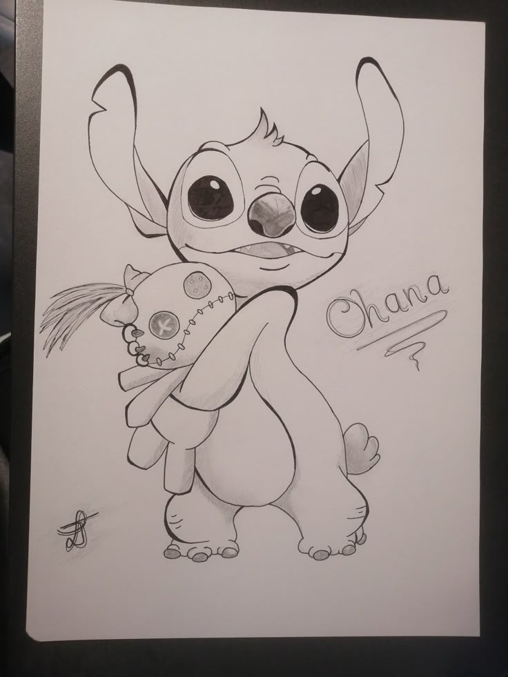 a drawing of stitchy holding a teddy bear with the word ohana written on it