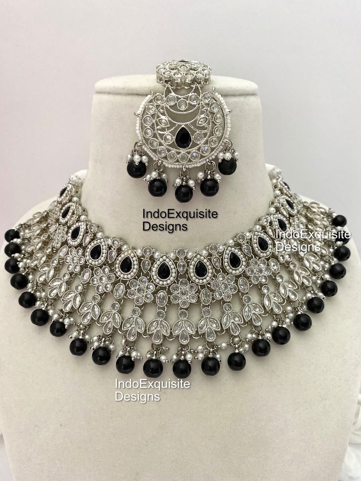 Polki Necklace Set in silver combination / Indian Jewelry/ High Quality Kundan and Polki Jewelry/ Bollywood Jewelry/Wedding Jewelry/silver jewelry/Bridal Set/Indian Pakistani Bride All items are shipped from Brampton, Ontario, Canada. If you need your item by a certain day, please reach out to us for express delivery option before placing the order so that we can update the shipping for you. Standard shipping/delivery timeline Below are the estimated delivery times after the order is shipped/dispatched.  ---> USA delivery timeline * 4-8 business days to major urban centers in USA. It may take 2-3 days extra to remote locations ---> Canada delivery timeline  * 2-3 business days - GTA  & Montreal  * 2-4  business days - Rest of Ontario/Quebec * 4-8 business days-  Rest of Canada (Please cons Elegant Silver Kundan Necklace With Stone Work, Fusion Style Silver Necklace With Cutdana, Silver Bridal Necklace With Cutdana For Wedding, Silver Cutdana Bridal Necklace For Wedding, Elegant Silver Bridal Sets For Festive Occasions, Silver Kundan Bollywood Tikka, Bollywood Style Silver Kundan Tikka, Silver Kundan Necklace With Cutdana For Celebration, Silver Kundan Necklace With Cutdana For Wedding