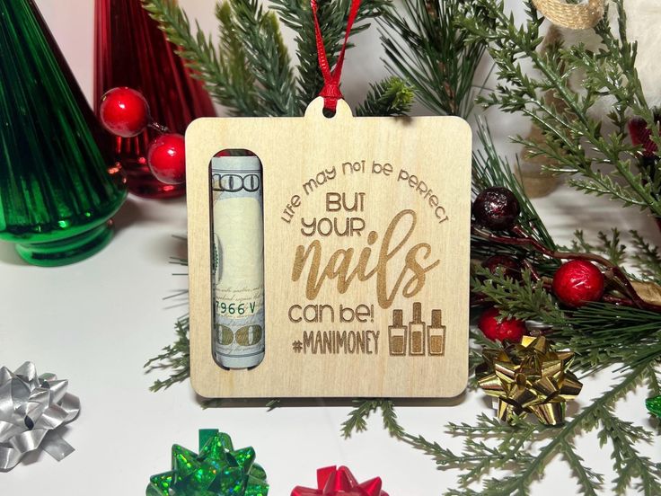 a wooden ornament that says, let's not be boring but your nails can be winning