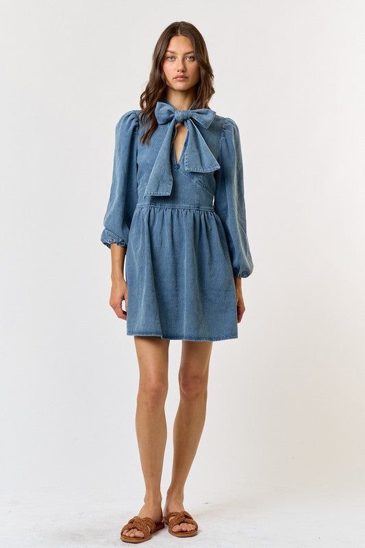 80% Cotton; 20% Polyester Fall Washed Cotton Denim Dress, Spring Denim Blue Denim Dress, Trendy Washed Blue Denim Dress For Spring, Trendy Washed Blue Denim Dress For Fall, Denim Dresses In Washed Blue For Fall, Washed Blue Denim Fall Dresses, Trendy Cotton Denim Dress For Fall, Fall Denim Dresses In Washed Blue, Chic Washed Long Sleeve Denim Dress