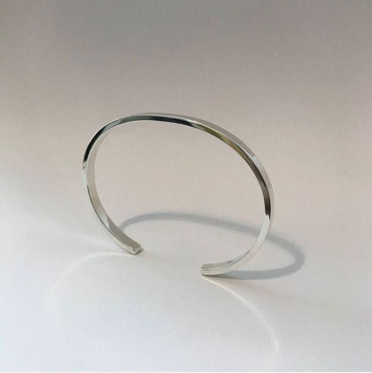 Plain Silver Cuff Bracelet - Etsy Minimalist Nickel-free Bangle Cuff Bracelet, Nickel-free Minimalist Sterling Silver Bangle Bracelet, Formal Nickel-free Metal Cuff Bracelet, Elegant Nickel-free Metal Cuff Bracelet, Silver Stainless Steel Cuff Bracelet, Tarnish Resistant, Silver Cuff Bracelet, Silver Cuff, Wire Wrapped Jewelry, Cuff Bracelet