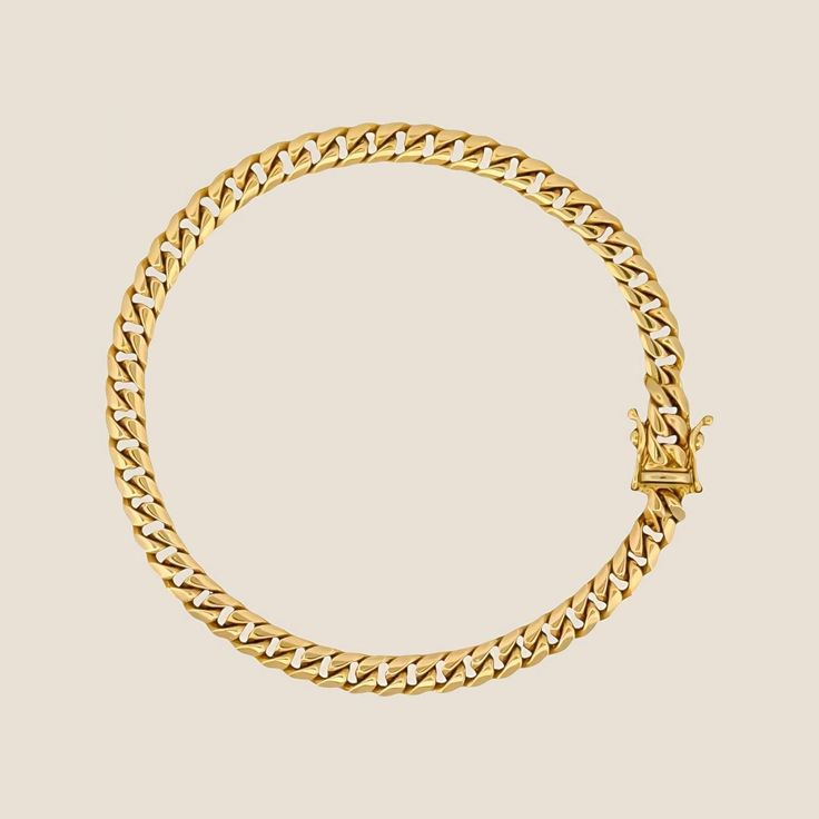 This gold bracelet features a sturdy 5MM Miami Cuban Link Bracelet with a secure clasp, offering both durability and a polished look for everyday wear. 14k solid gold Box lock Made in Italy Chain and bracelet lengths are measured in inches. *Weights provided are estimates only. Actual weight may differ. Luxury Gold Cuban Link Bracelet In Fine Jewelry Style, Classic Tarnish Resistant Cuban Link Bracelet, Classic Cuban Link Chain Bracelet, Classic Cuban Link Bracelet, Classic Cuban Link Jubilee Bracelet, Classic Round Cuban Link Bracelet With Polished Finish, Classic Round Cuban Link Bracelet, Tarnish Resistant, Classic Round Cuban Link Bracelet Tarnish Resistant, Classic Round Cuban Link Tarnish Resistant Bracelet