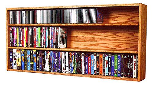 a wooden shelf with several different types of dvd's