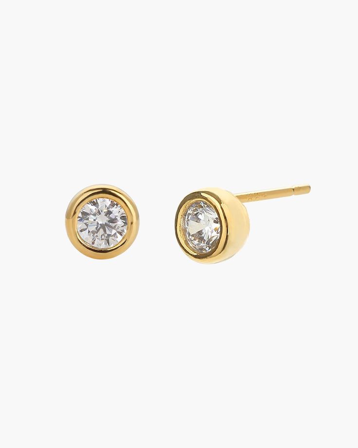 Elevate your style with the Margot Stud Earring, featuring a sparkling, circular accent encased in a round gold frame. This elegant stud design offers a sophisticated touch, perfect for enhancing any outfit with a classic yet contemporary flair. 18k gold over sterling silver Cubic Zirconia Our gold covering on silver is a thick layer of 18k solid gold on sterling silver meaning it will last longer. You get the look and feel of gold jewelry at a fraction of the price. Round Gold Frame, Silver Meaning, Stud Design, Sneaker Dress Shoes, Jewelry Sterling Silver, Gold Earrings Studs, Stud Earring, Evening Clutch Bag, Gold Frame