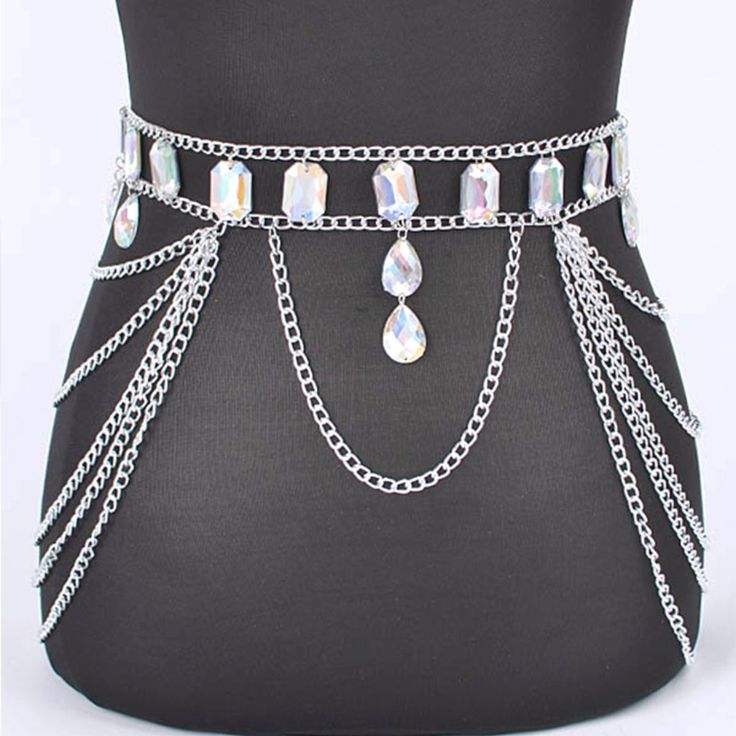 Brand New With Tag This Iconic Bejeweled Statement Chain Belt Is A One Of A Kind Outfit Uplifter. From Coachella To A Costume Party... Size: One Size 1.25" Wide 46.5" Long (Clasp To End) Acrylic Stone This Belt Usually Fits Size S - L. All From Smoke Free/Pet Free Environment. Please Message Me If You Have Any Questions:) Thank You For Your Visit- Silver Crystal Waist Chain For Party, Trendy Silver Waist Chain With Chain Strap, Adjustable Chain Link Waist Chain For Parties, Party Adjustable Chain Link Waist Chain, Trendy Metal Chain Belt For Party, Trendy Silver Metal Chain Belt, Trendy Silver Chain Belt For Party, Silver Crystal Chain Belt For Party, Trendy Silver Body Chain For Party