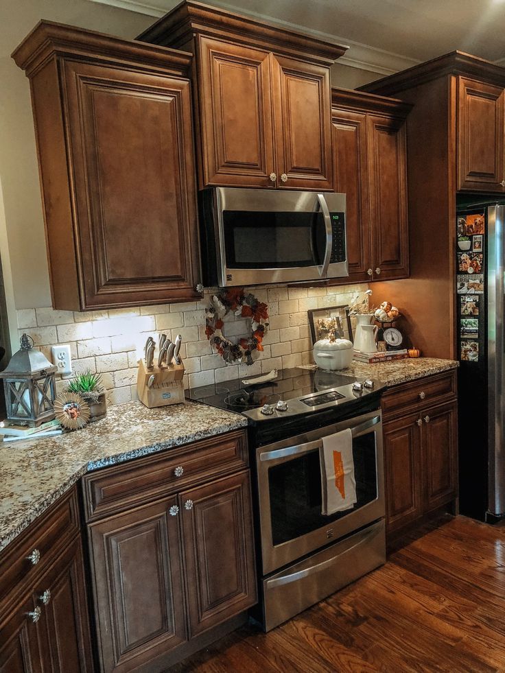 dark brown Kitchen Design Ideas - Decorating dark brown Kitchens Cabinet (paid link) Farmhouse Kitchen With Brown Cabinets, Brown Kitchen Decor Ideas, Kitchen Backsplash Ideas Brown Cabinets, U Shaped Kitchen Island, Brown Kitchen Decor, Dark Brown Kitchen Cabinets, Brown Kitchen Ideas, Dark Brown Kitchen, Dark Brown Cabinets Kitchen