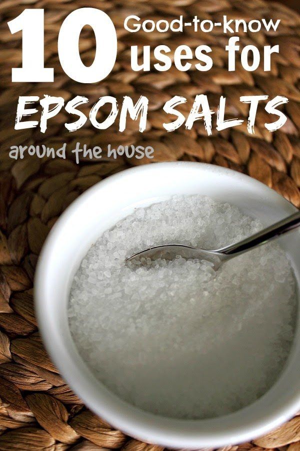 a white bowl filled with epsom salts on top of a woven basket