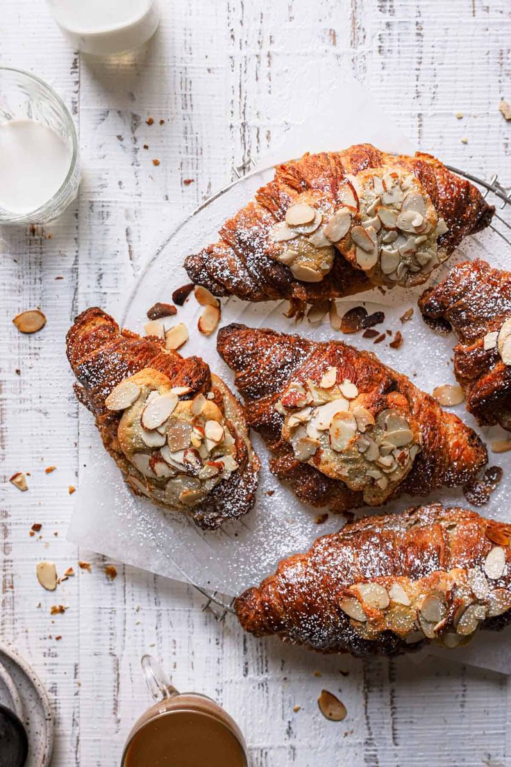 almond croissants with powdered sugar on top