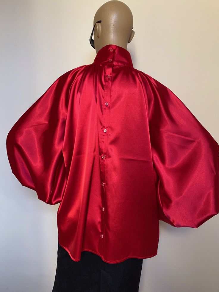 "This is a very stylish Womens Satin blouse in beautiful Candy apple red color. It is comfortable and cozy. Made for a free flowing fit. Great for all year around and for any special occasion or casual day can be dressed up or dressed down. SIZE CHART SIZE S - US 6, UK 8, EU 36 bust: bust around 34.5\"/90cm Waist: waist around 27.5\"/70cm Hips: hips around 34.5\"/90cm SIZE M - US 8, UK 10, EU 38 bust: bust around 37.5\"/95cm Waist: waist around 29.5\"/75cm Hips: hips around 37.5\"/95cm SIZE L - Apple Red Color, Satin Bow Blouse, High Neck Shirt, Blouse High Neck, Black Satin Blouse, Bishop Sleeve Blouse, Victorian Collar, High Neck Shirts, Plus Size Blouse