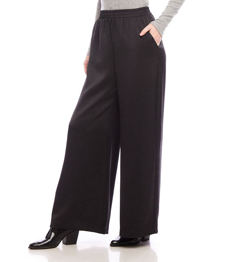 Effortlessly chic and versatile, our wide leg pants are made of luxurious satin material and come in a fashionable full length design.. Available in both black and cognac colors, these pants are the perfect addition to your fall wardrobe. Embrace comfort and style with our must-have pants. Recycled Satin: 55% Polyester 45% Recycled Polyester Made in the USA of Imported Fabric Dry Clean Only Length: Full length Elasticized waistband Front rise: 13 1/8 inches (size M) Inseam: 29 1/4 inches (all si Elegant Wide Leg Viscose Bottoms, Elegant Black Wide Leg Viscose Pants, Elegant Black Viscose Wide Leg Pants, Elegant Relaxed Fit Silk Pants, Elegant Silk Pants With Relaxed Fit, Fall Viscose Wide Leg Work Pants, Fall Wide Leg Viscose Pants For Work, Full-length Viscose Pants For Workwear, Viscose Full-length Workwear Pants