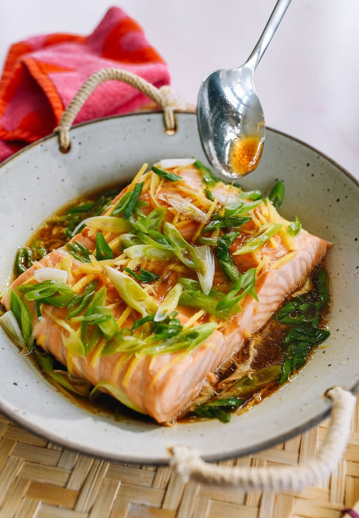 a close up of a plate of food with fish