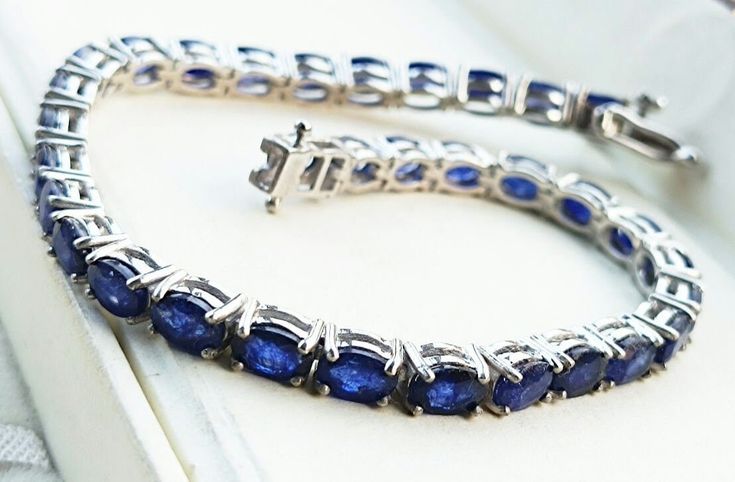 Natural Blue Sapphire Tennis Bracelet in Sterling Silver. September Birthstone Bracelet. Gemstone Tennis Bracelet. Women Tennis Bracelet. Product details -- Product Type - Bracelet  Bracelet Type - Tennis Bracelet  Gemstone -  Blue Sapphire  Sapphire Size - 6x4mm Sapphire Shape - Oval Sapphire colour - Blue  Necklace setting Type - Prong  Regards by  RhemajewelryShop Fine Jewelry Sapphire Bracelets, Tennis Bracelet With Gemstone Accents As Gift, Gift Tennis Bracelet With Gemstone Accents, Hand Set Sapphire Bracelet Jewelry, Blue Sapphire Bracelets Hand Set, Formal Blue Bracelets With Gemstone Accents, Sapphire Gemstone Tennis Bracelet In Fine Jewelry Style, Elegant Tennis Bracelet With Stones, Sapphire Gemstone Tennis Bracelet As Gift