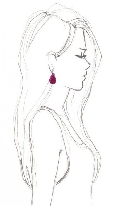 a drawing of a woman's face with long hair and red earrings on her ear