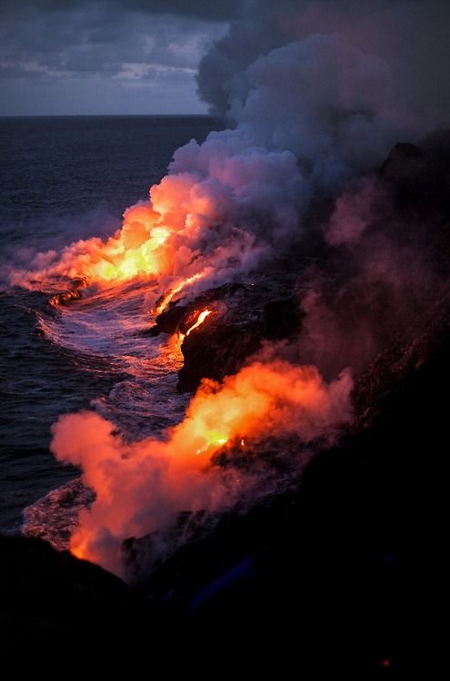 the lava is glowing red and orange as it flows into the ocean