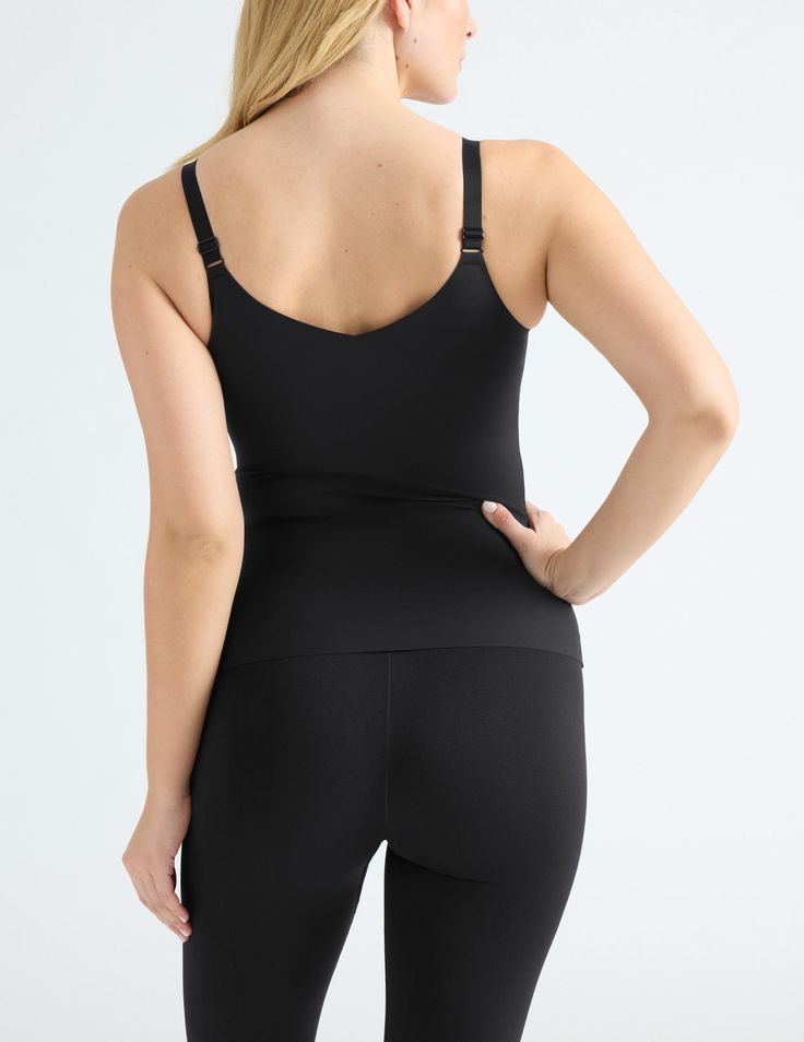 Going braless has never felt better than in our super-versatile, one-of-a-kind tank. Featuring the wireless, built-in support and luxurious feel of our LuxeLift Technology, in a seamless, figure-flattering fit. Find your new favorite wardrobe essential with support for cup sizes A to G. Now with NEW upgraded adjustable straps for a more customized fit! | Knix LuxeLift V-Neck Tank Top in Black Shaping Sports Bra With Built-in Support, Sculpting Sleeveless Activewear With Built-in Bra, Compression Shapewear With Built-in Bra For Yoga, Shapewear With Built-in Bra For Yoga, Shapewear Tank Top With Built-in Bra And Wide Straps, Medium Support Camisole Tank Top With Built-in Bra, Supportive Shapewear Tank Top With Built-in Bra, Black Compression Tank Top With Built-in Bra, Yoga Shapewear With Compression And Built-in Bra