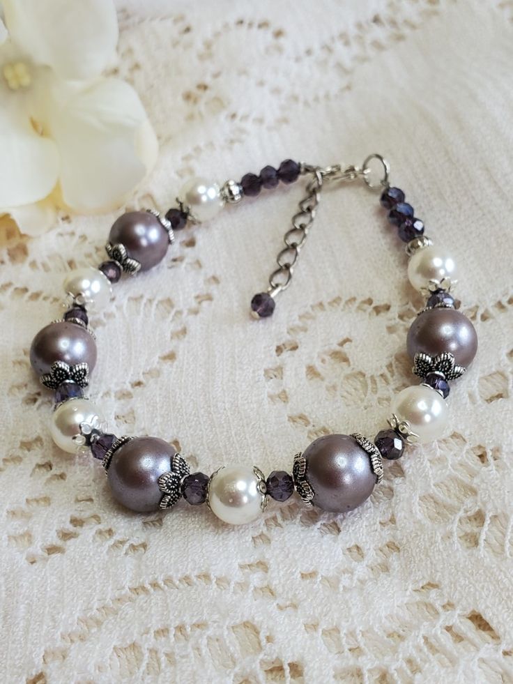 $20.95 Elegant Lavender Beaded Bracelets, Elegant Purple Pearl Bracelet With Round Beads, Elegant Beaded Lavender Bracelets, Elegant Lavender Beaded Bracelet, Handmade Elegant Purple Pearl Bracelet, Elegant Handmade Purple Pearl Bracelet, Pearl Beaded Bracelet, Womens Bracelet, Womens Jewelry