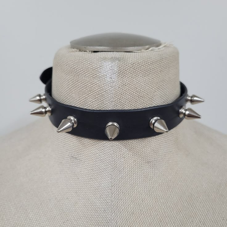 Handmade leather choker adjustable from 13 inches up to 16 inches. (13", 13 1/2", 14", 14 1/2", 15", 15 1/2", 16") leather is ~ 1.8 to 2.2 MM thick choker contains 7 spikes (0.5 inch in lenght) Gothic Spiked Choker For Festivals, Adjustable Punk Choker For Alternative Fashion, Party Choker With Spikes, Punk Spikes Choker For Party, Punk Spiked Choker For Parties, Rocker Style Festival Choker Jewelry, Adjustable Trendy Choker For Concerts, Punk Choker With Spikes, Concert Choker With Spikes