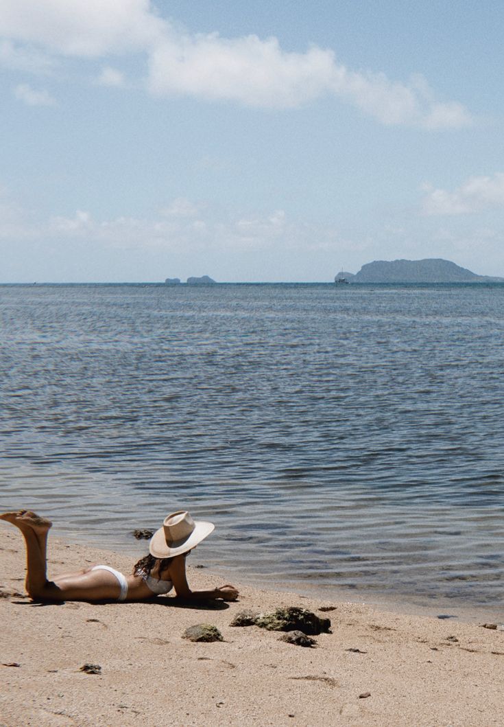 We teamed up with woman ran UNSECO protected artisans in Ecuador, the original origin of the Panama hat. Together we created a two tone wide brim sun hat. Handcrafted out of 100% natural toquilla straw. Natural coloring on the left side, toasted toquilla on the right. A teardrop crown measuring 9cm & a slightly sloped brim at 13cm. The Ivory & Mads is the perfect statement hat while staying practical with its design for sun coverage, its neutral colors, and quality build. This hat celebrates & h Luxury Brimmed Woven Sun Hat, Luxury Brimmed Panama Hat For Summer, Luxury Woven Brimmed Sun Hat, Luxury Natural Brimmed Panama Hat, Affordable Wide Brim Panama Hat For Beach, Luxury Brimmed Panama Hat In Toquilla Straw, Luxury Summer Brimmed Panama Hat, Luxury Woven Sun Hat For Summer, Luxury Wide Brim Toquilla Straw Sun Hat