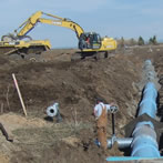 water pipe and excavator