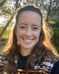 Headshot of Erin smiling at the camera