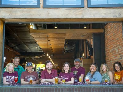 Photo of a group enjoying time together at a Griz on Tap social event.