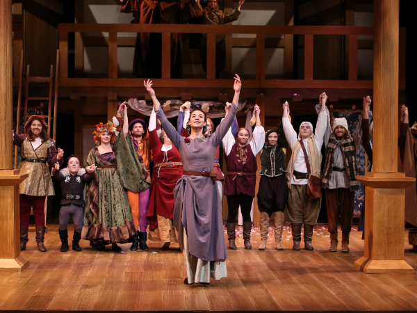 The 2017 cast of "As You Like It" raising their arms at curtain call. 