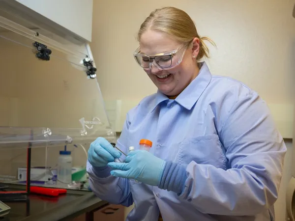 A UM student presents research at a conference