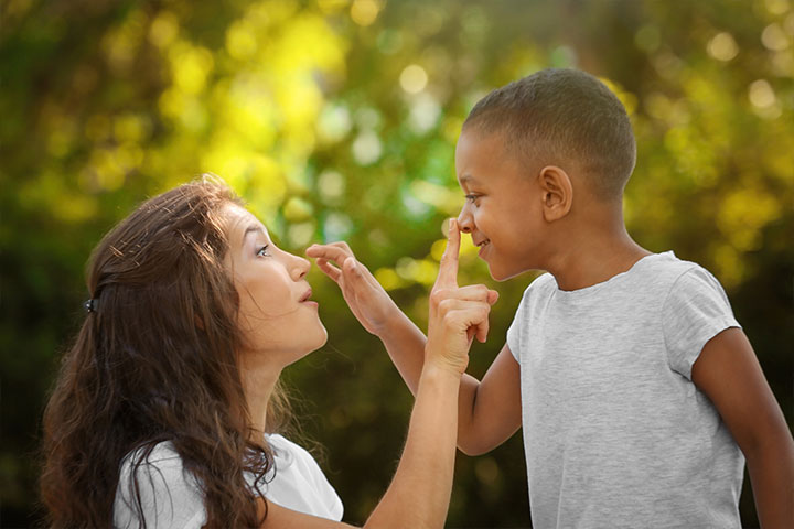 mother and son touching each others noses