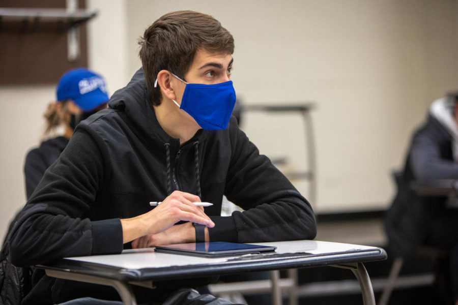 A UK student takes notes on an iPad in a class on Friday, Feb. 5, 2021, at White Hall Classroom Building in Lexington, Kentucky. Photo by Jack Weaver | Kentucky Kernel