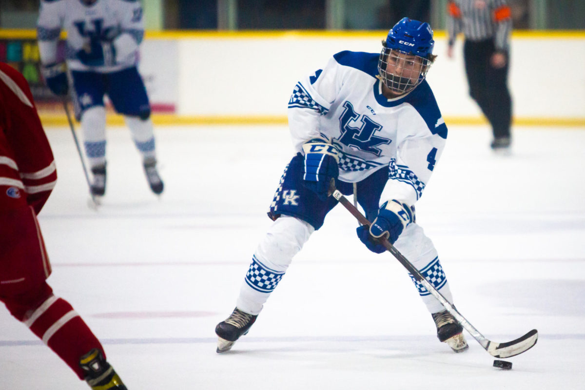 Kentucky winger Daniel Quartapella (4) prepares to hit the bacll during the Kentucky vs. Boston University hockey game on Saturday, Sept. 16, 2023, at the Lexington Ice and Recreation center in Lexington, Kentucky. Kentucky lost 3-4. Photo by Samuel Colmar | Staff